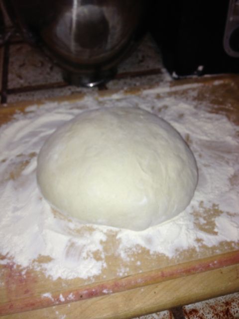 Shaped dough on floured board